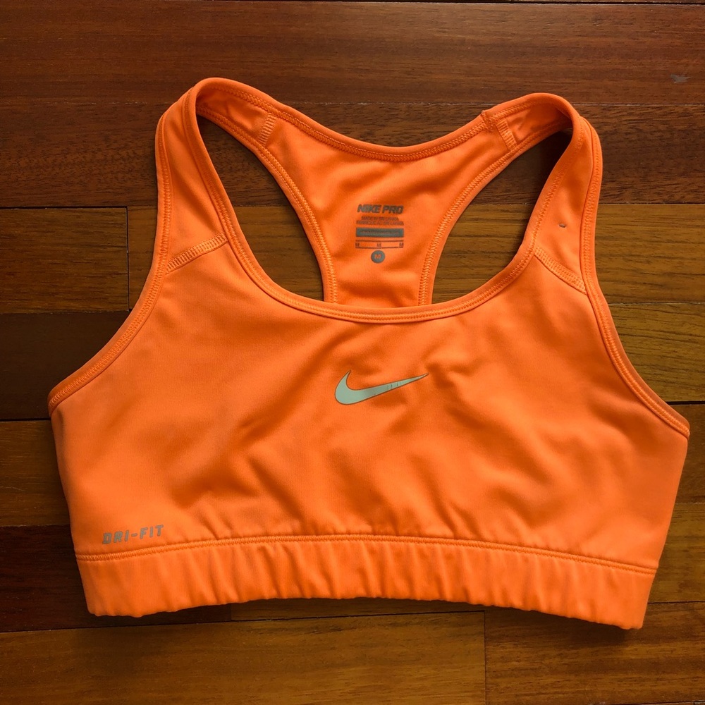 Bright orange Nike sports bra